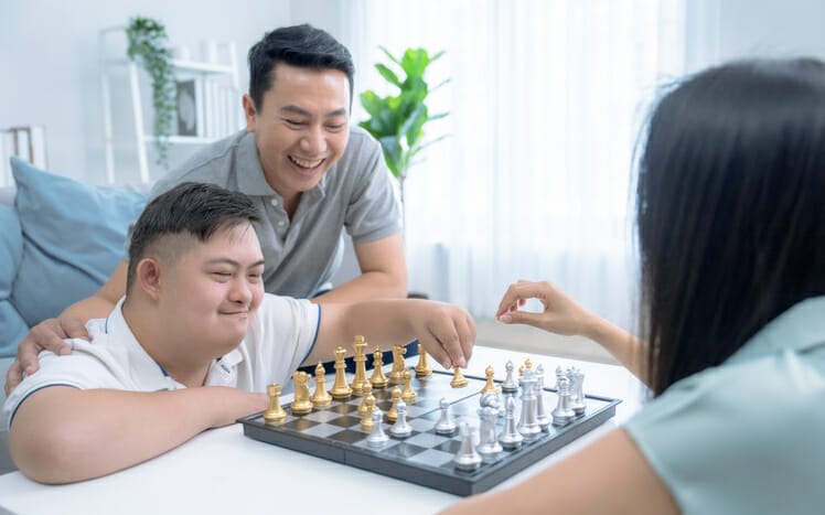 disabled young man playing chess